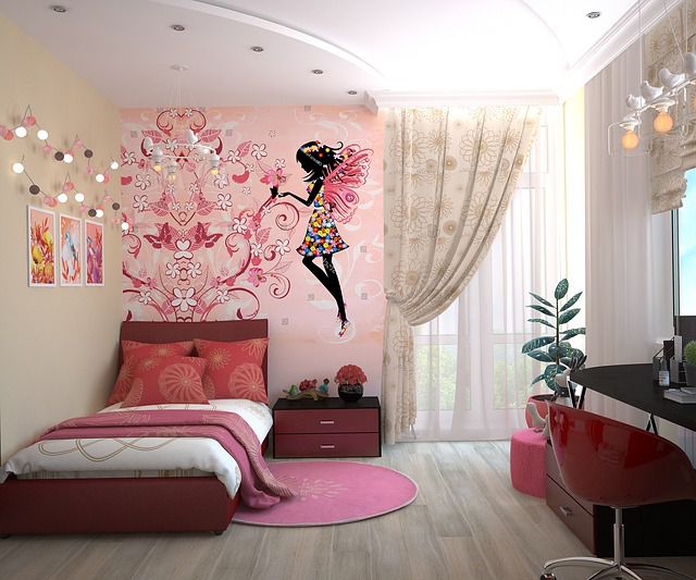 A generic girl’s room with pink furniture, accessories, and a fairy painted on a wall.