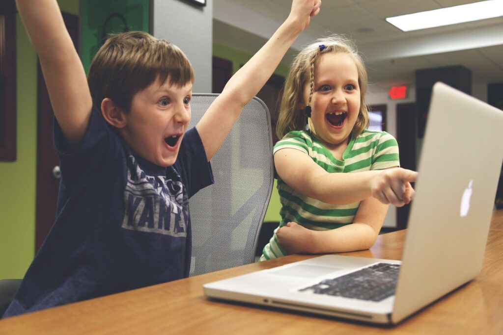 children gaming on a computer 