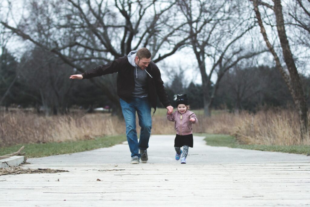 man and girl running