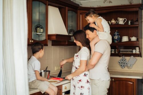 a family cooking together