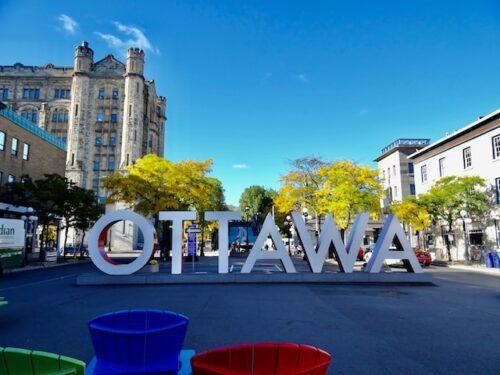 Word OTTAWA spelled in big letters in the city square