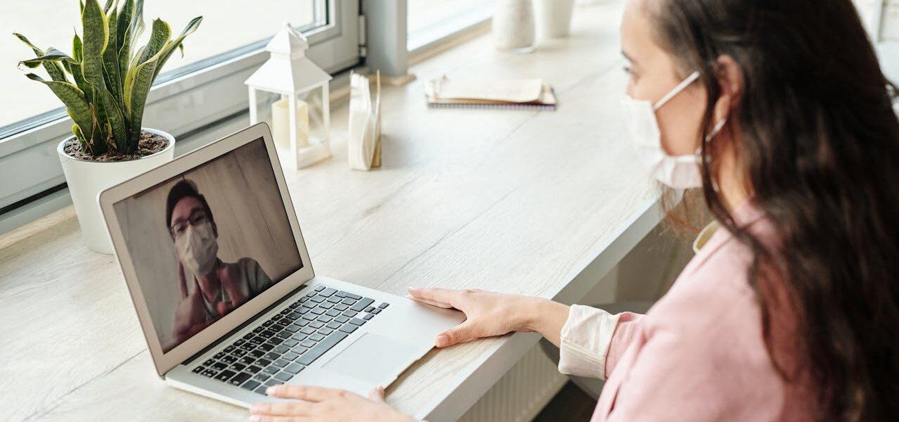 woman on a telehealth appointment online