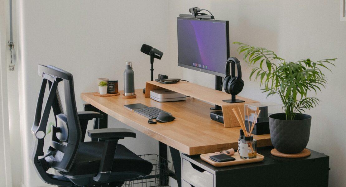Modern minimalist home office with a computer workstation supporting a paperless lifestyle for sustainable and organized living.