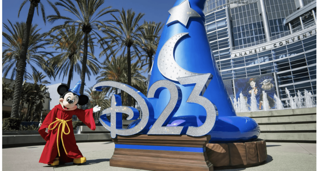 Mickey Mouse beside a D23 display outside the Anaheim Convention Center