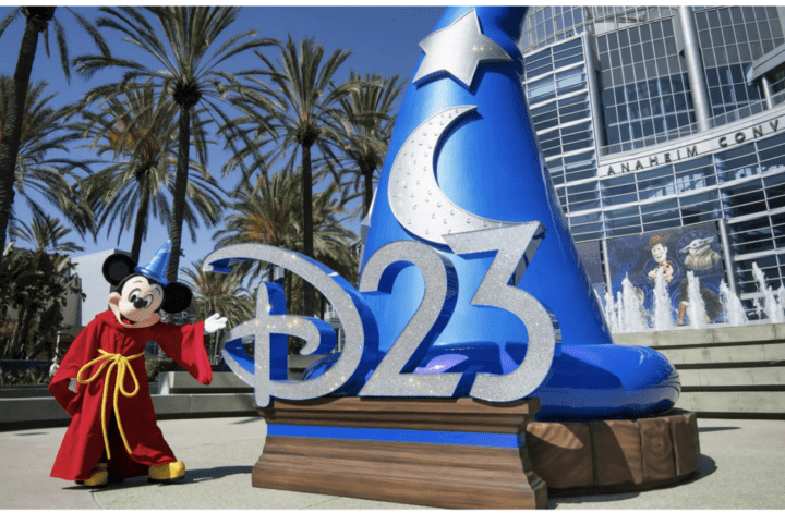 Mickey Mouse beside a D23 display outside the Anaheim Convention Center
