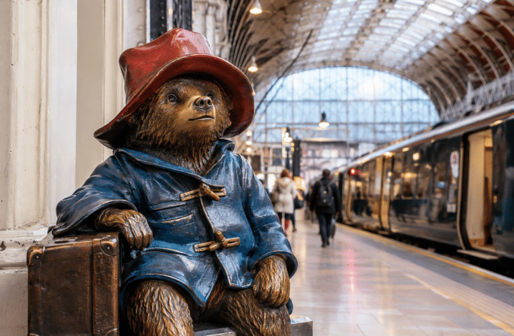 Paddington Bear at a London railway station platform